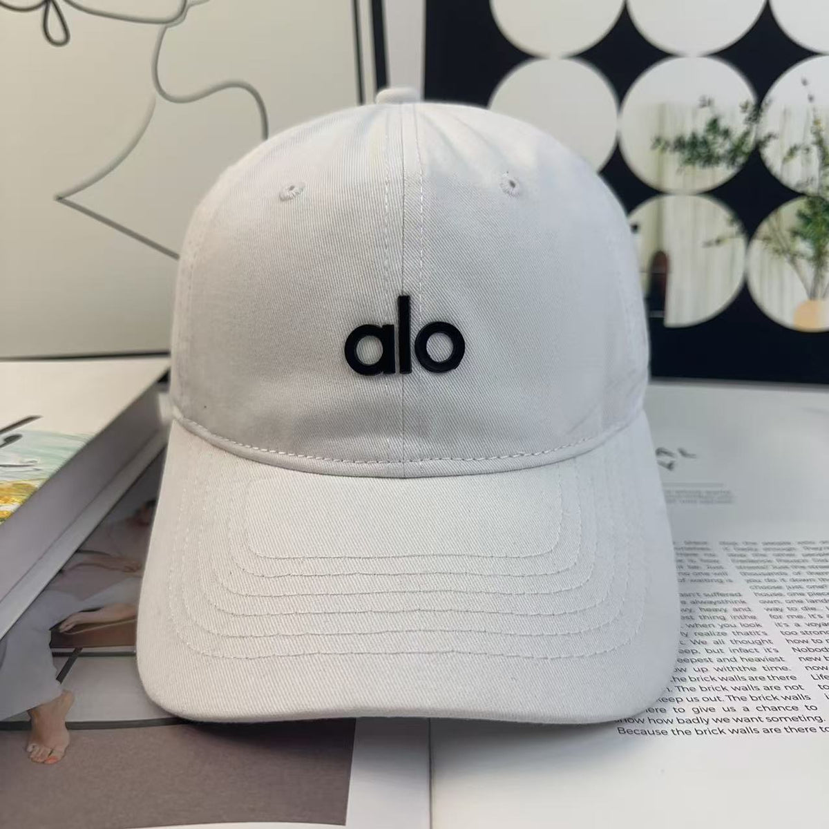 A L O Cap