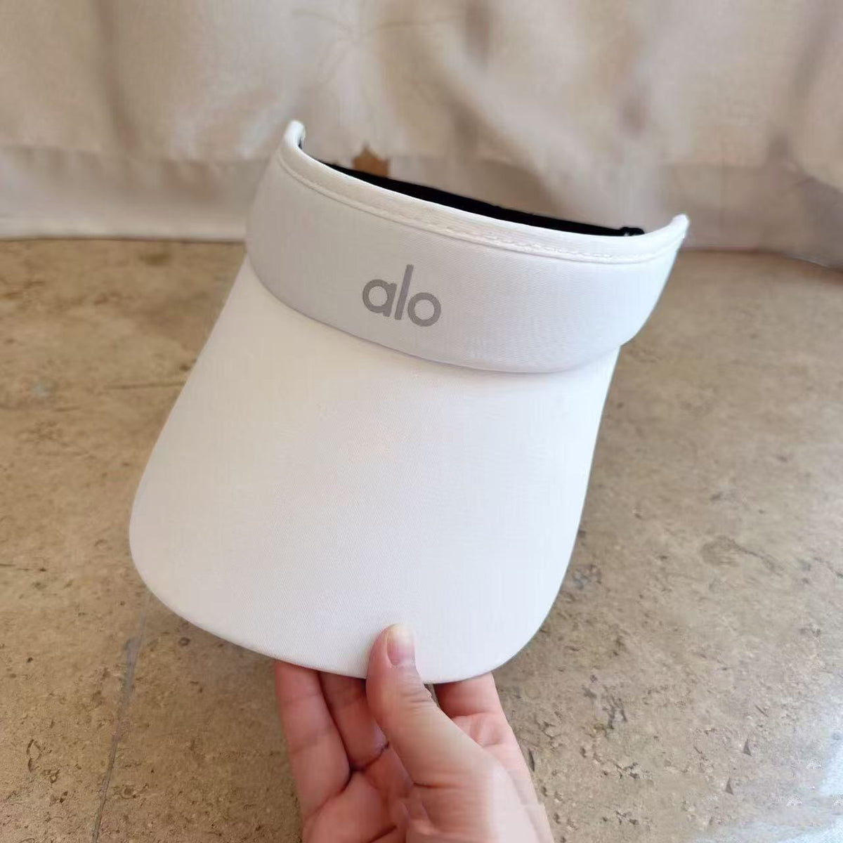 A L O cap